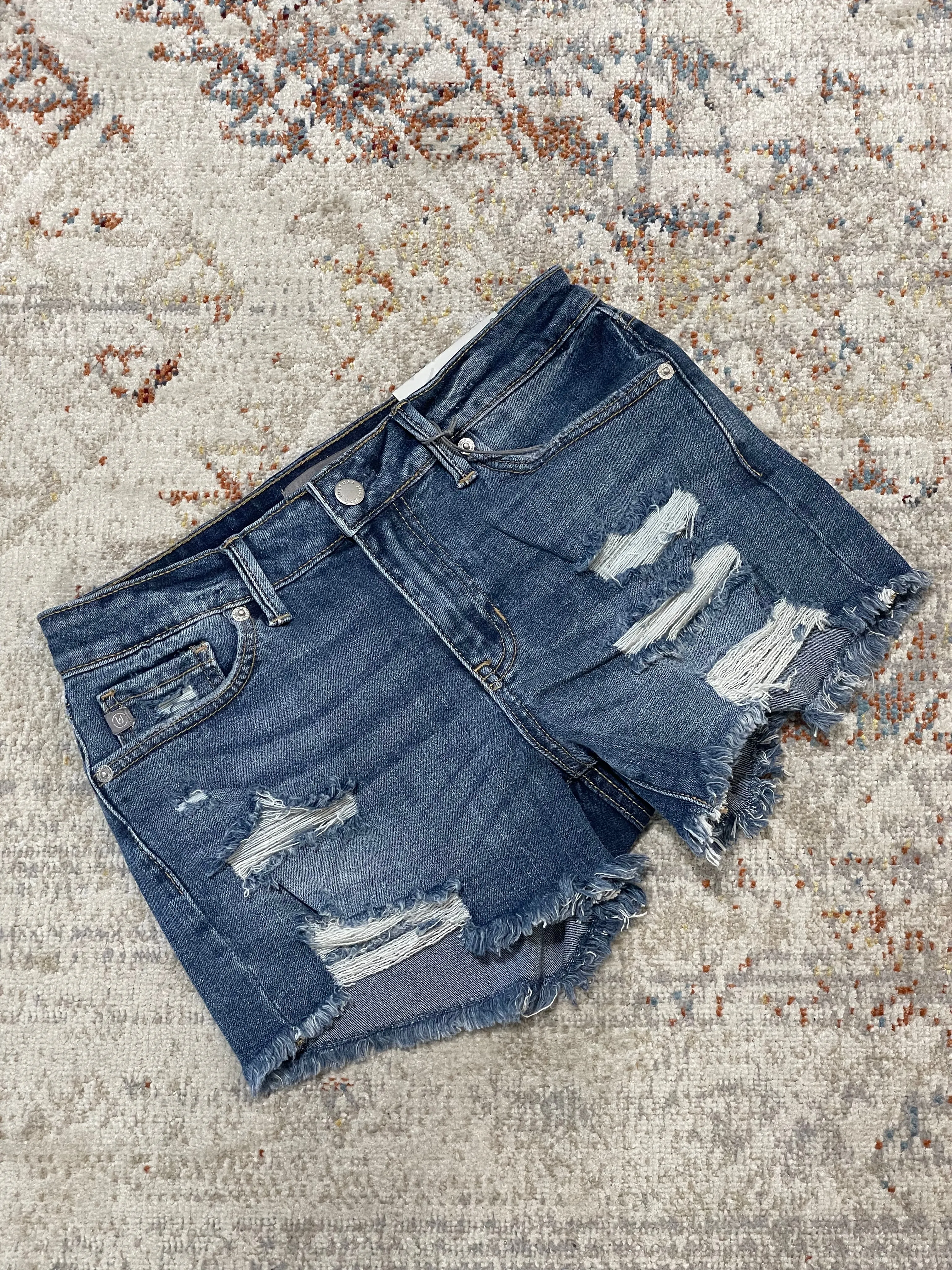 Mid Rise Medium Denim Distressed Beach Short by Just USA